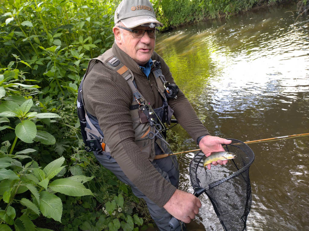 Photo of John with the Alder trout